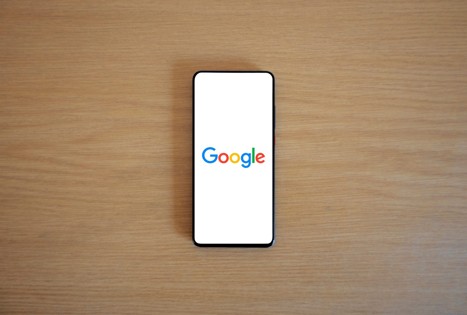 Google search on a smartphone, comparing paid platforms